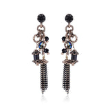 Metal dangle earrings blue stone