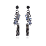 Metal dangle earrings blue stone